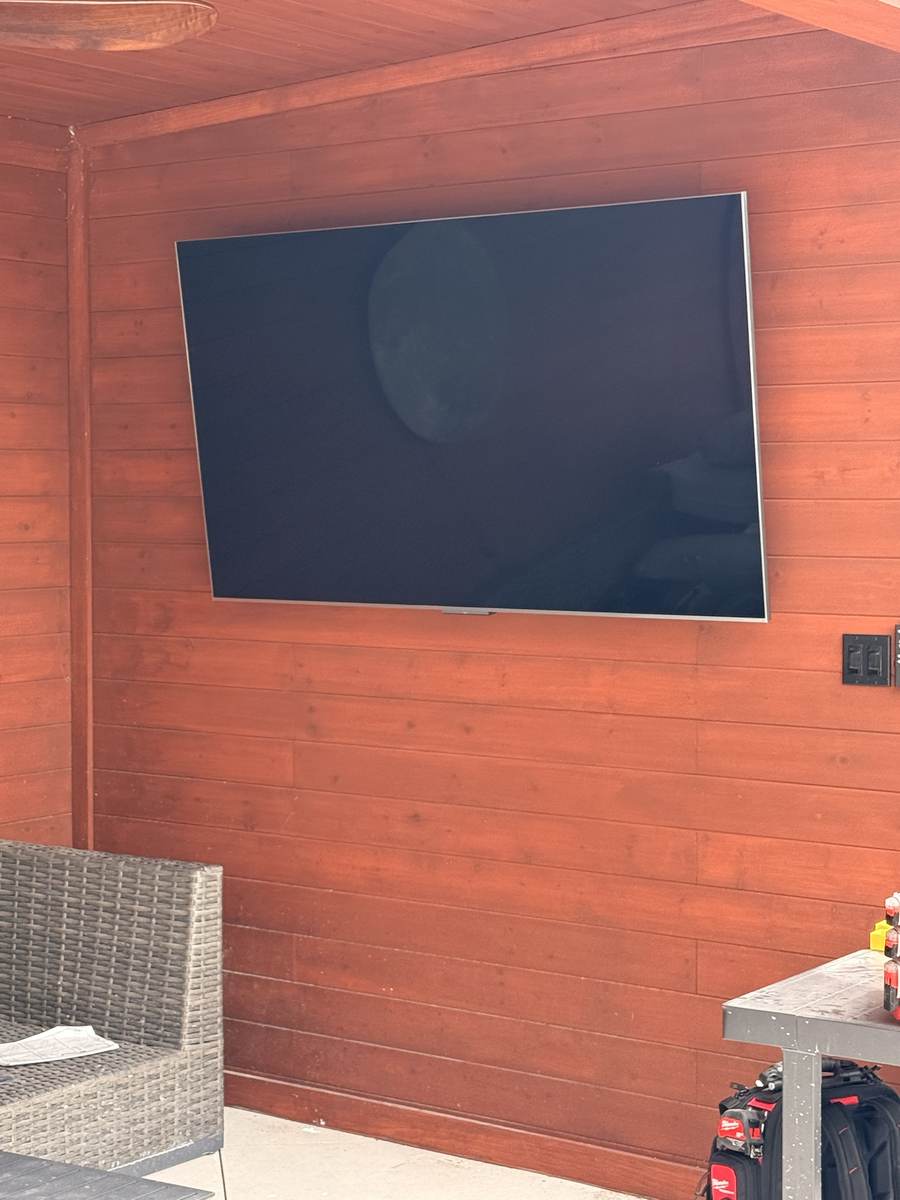 Covered patio, mounted on wood siding